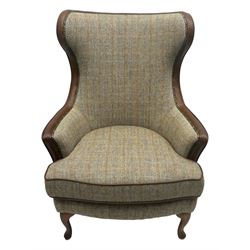 Wood Bros - contemporary wingback armchair, high back with curved wings upholstered in herringbone patterned fabric, accented with leather trim and brass nailhead studs, resting on cabriole front feet 