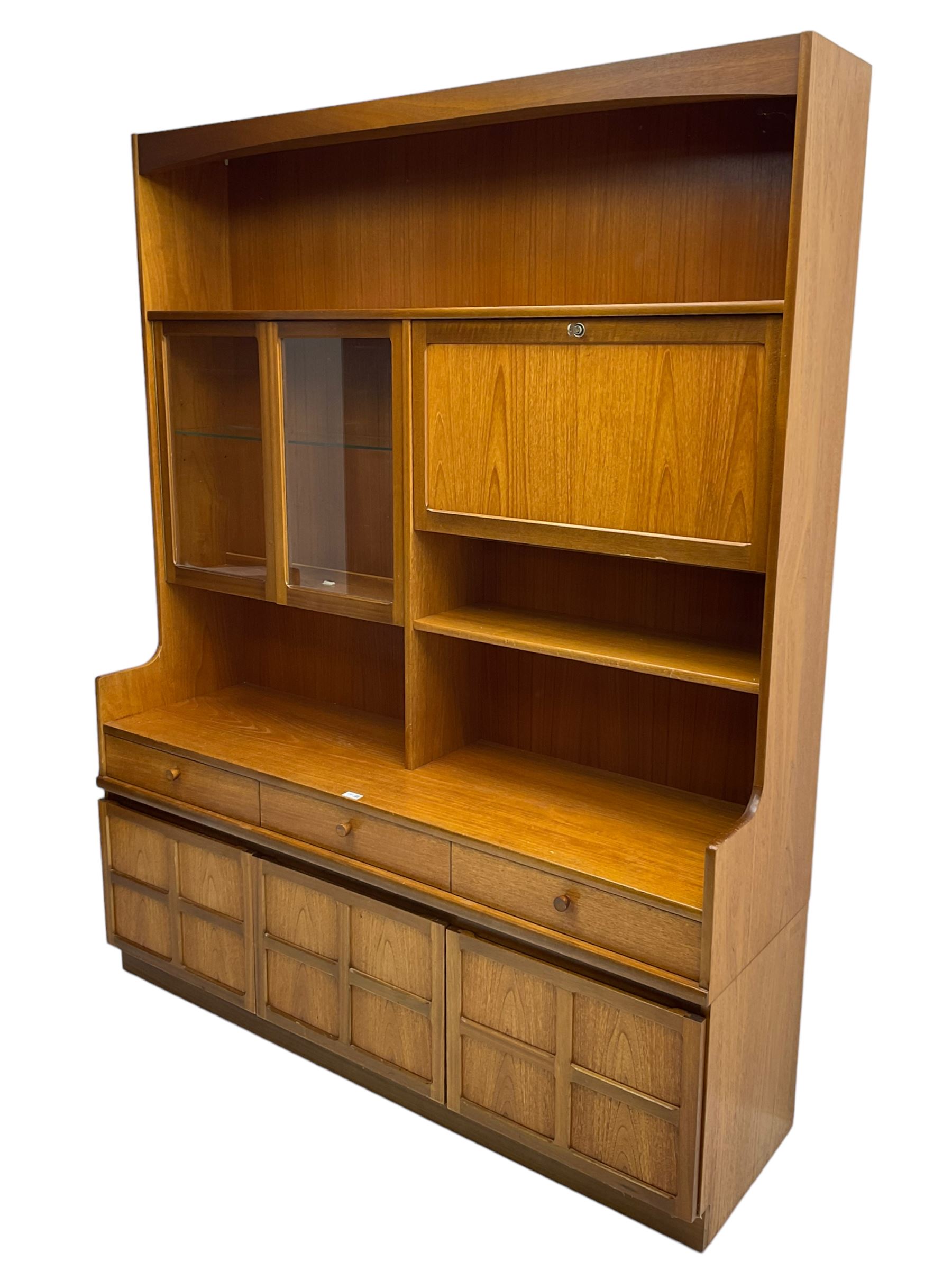 Nathan - teak wall unit, fitted with raised display cabinet and fall front compartment, three drawers and three cupboards below