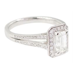 18ct white gold emerald cut and round brilliant cut diamond cluster ring, with diamond set shoulders, principal diamond 0.82 carat, colour G, clarity VS1, with HRD Antwerp report, total diamond weight approx 1.00 carat