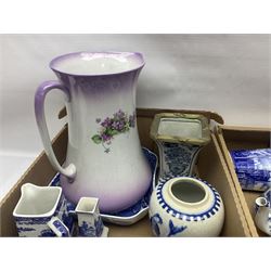 Large Kiralpo Ware wash jug, with purple and white floral decoration, together with a collection of blue and white ceramics including Ringtons