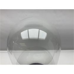 Glass dome upon circular base, H53cm