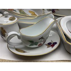 Royal Worcester Evesham pattern, including covered pot de cremes, twin handle tureen, serving dishes, flan dishes, side plates etc  