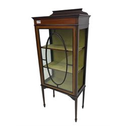 Edwardian inlaid mahogany display cabinet, shaped and raised back over single astragal glazed door, interior lined and fitted with two shelves, raised on square tapering supports