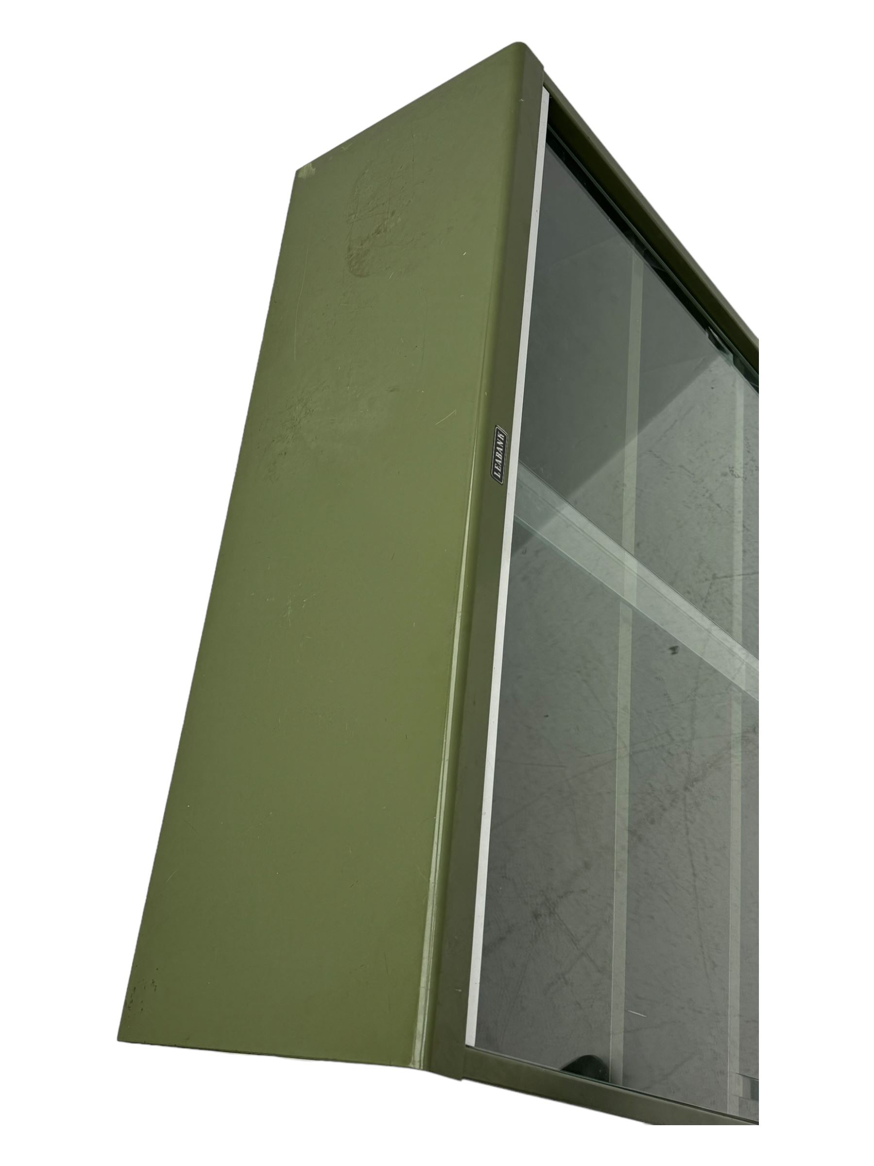 Mid-20th century 'Leabank' metal display cabinet, two sliding glass doors enclosing two adjustable metal shelves, olive green finish with chrome trim