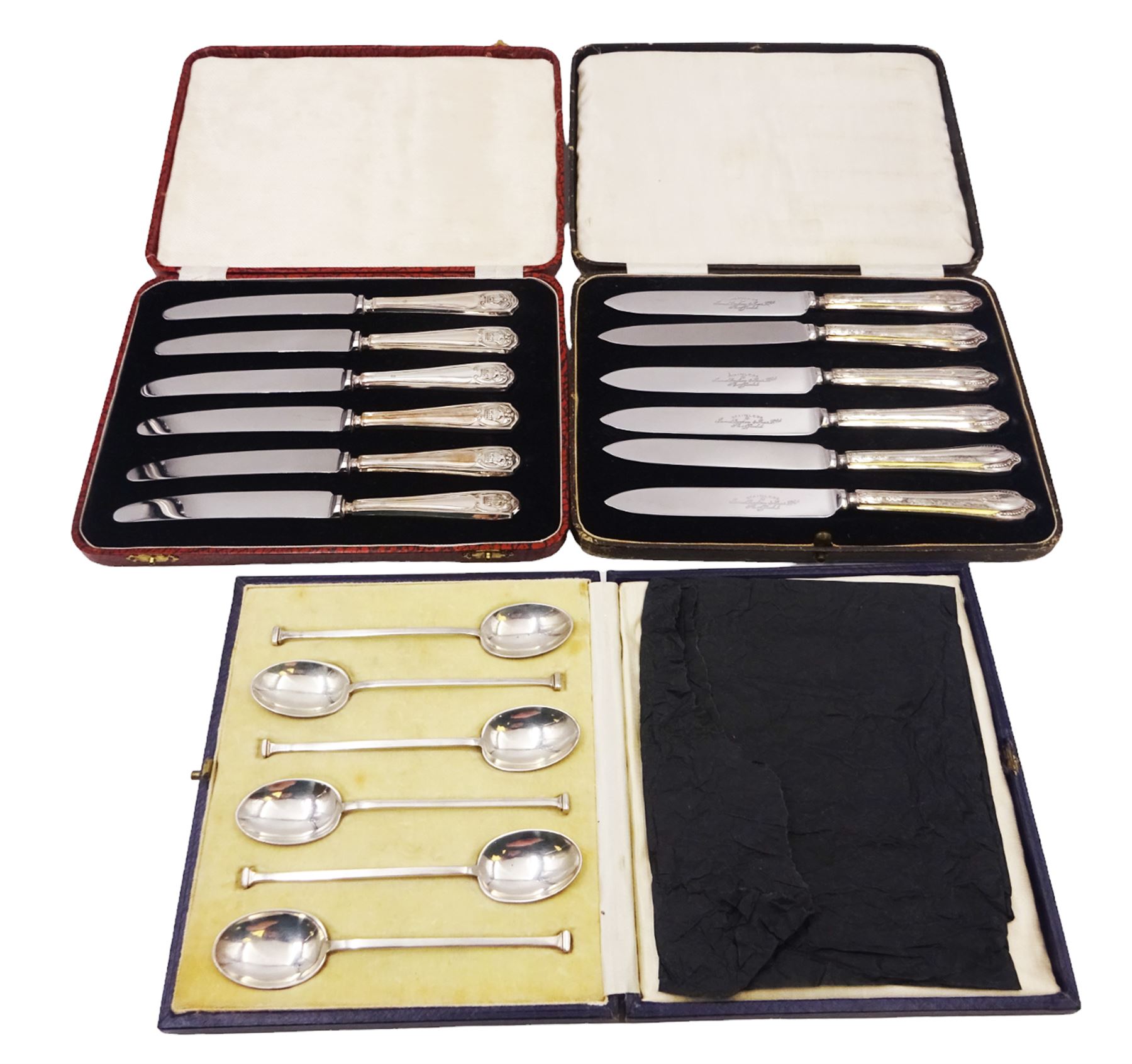 Set of six 1920s silver coffee spoons, hallmarked Mappin & Webb Ltd, Sheffield 1927, together with two sets of silver handled knives,  all contained within fitted cases