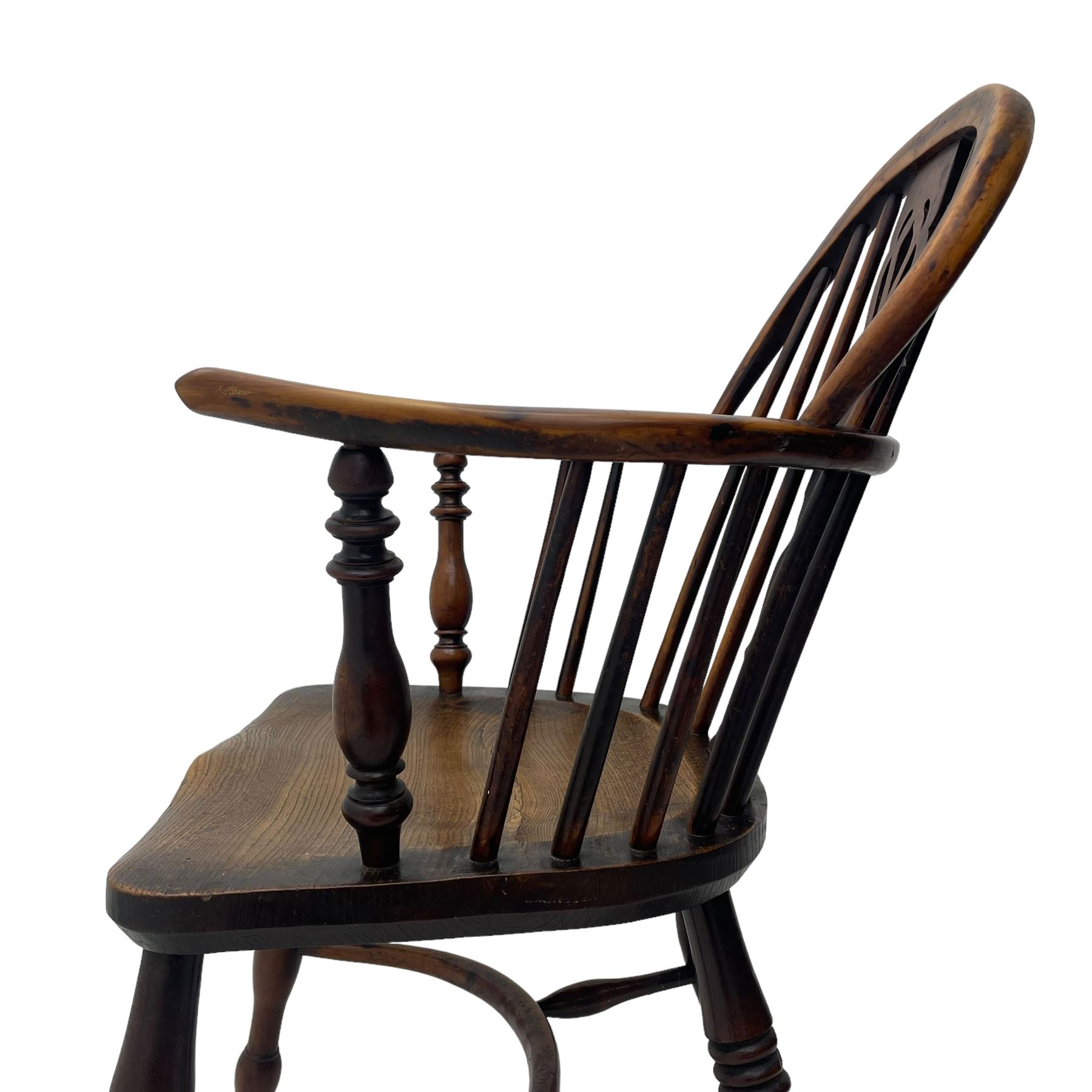 19th century yew wood and elm Windsor armchair, low double hoop stick and pierced splat back, dished seat on turned supports united by crinoline stretchers