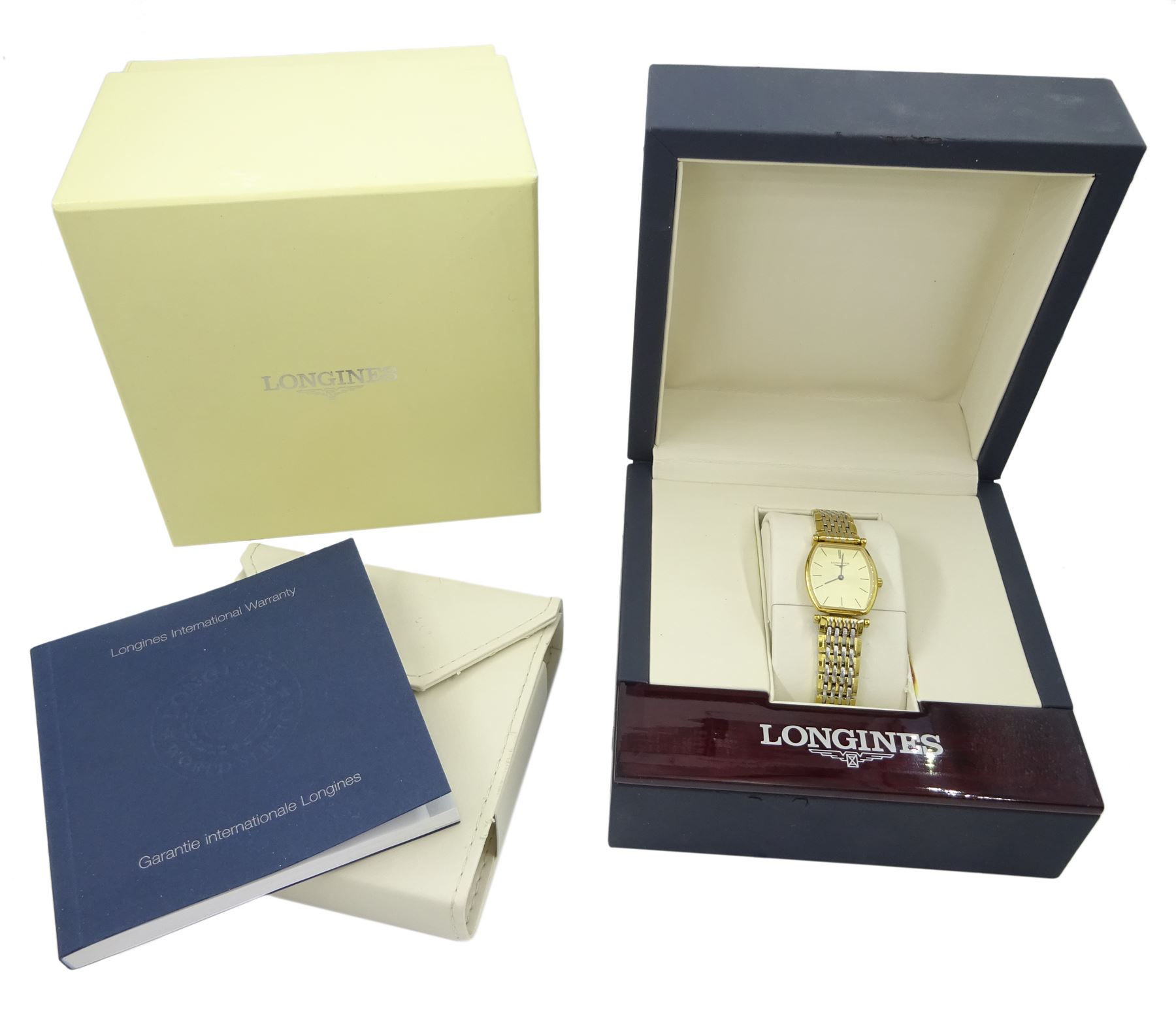 Longines La Grand Classique ladies gold-plated and stainless steel quartz wristwatch, Ref. L4 205 2, champagne dial with baton hour markers, boxed with guarantee card dated 2009 and additional links