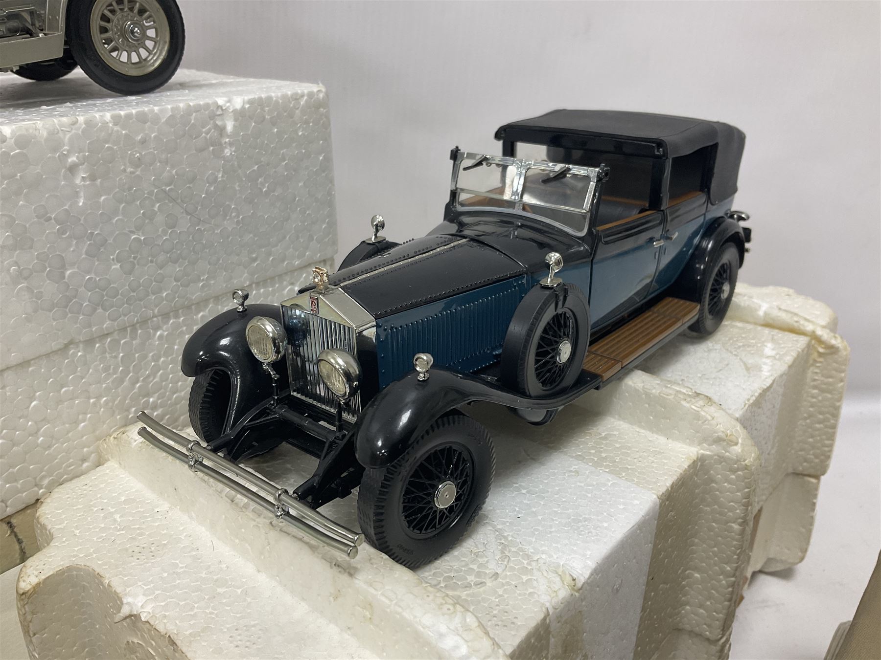 Franklin Mint - six 1:24 scale die-cast Rolls-Royce models comprising 1907 Rolls-Royce ‘The Silver Ghost’, boxed with original packaging and paperwork, 1929 Rolls-Royce ‘Phantom I’ with original packing, 1914 Rolls-Royce, 1911 Rolls-Royce, 1955 Rolls-Royce ‘Silver Cloud 1’, and 1992 Rolls-Royce Corniche IV 