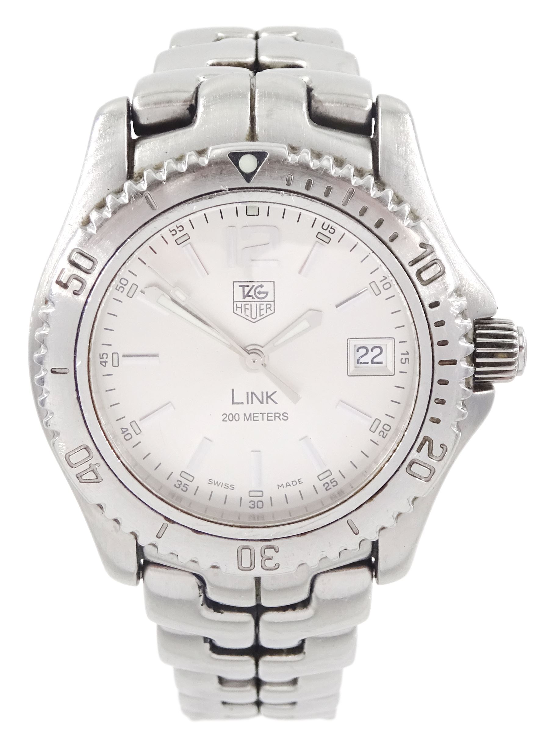 Tag Heuer Link 200 meters gentleman's stainless steel quartz wristwatch, Ref. WT1212-0, silvered dial with date aperture, on integral stainless steel bracelet, with fold-over clasp, boxed