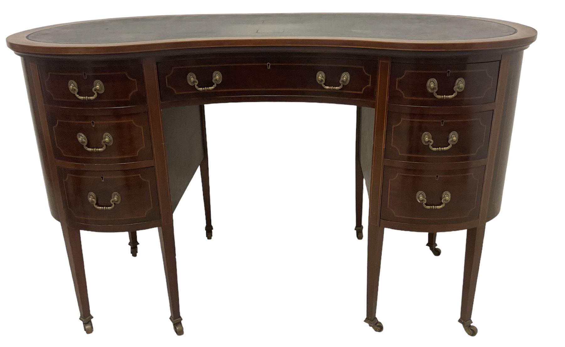 Georgian design mahogany kidney shaped desk, fitted with green leather writing surface, over single frieze drawer and six graduating drawers with checkered inlaid stringing, square tapering supports with castors