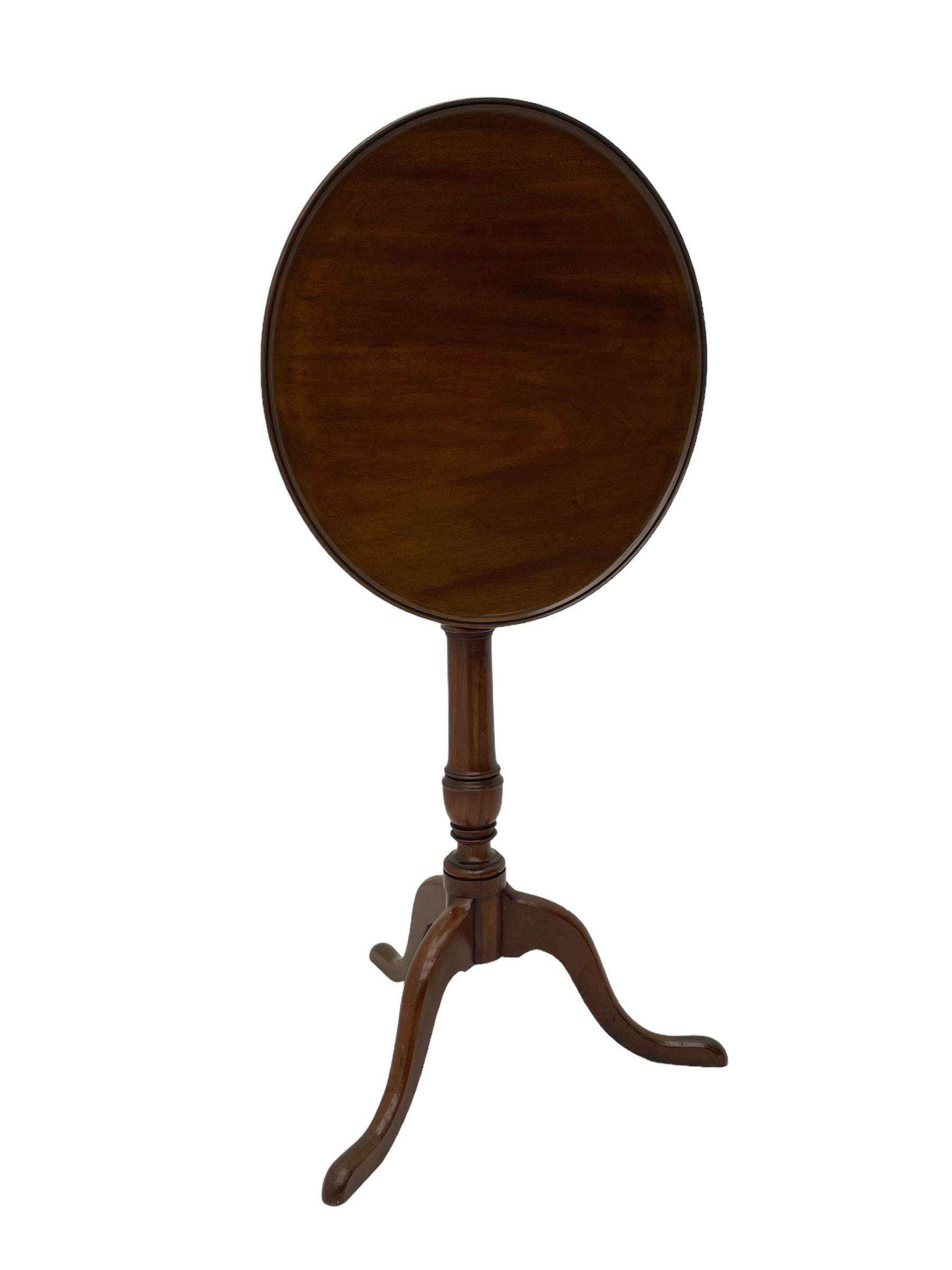 George III mahogany tripod table, circular moulded dished tilt-top, ring turned stem on three splayed supports 