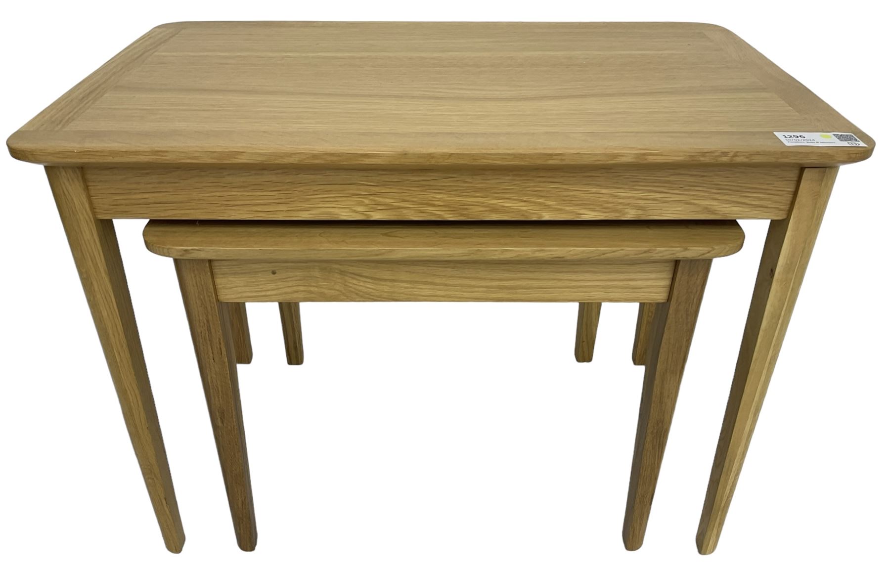 Contemporary light oak nest of two tables, rectangular top over tapering supports