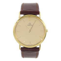 Omega gentleman's 9ct gold quartz wristwatch, champagne dial, with baton hour markers, on brown leather strap