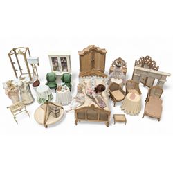 Dolls house bathroom and bedroom furniture, including bed, wardrobe, dresser filled with t...