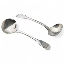 Pair of early Victorian provincial silver fiddle pattern sauce ladles engraved with a cres...