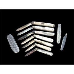 Seven mother of pearl handled silver fruit knives, all with folding silver blades, hallmar...