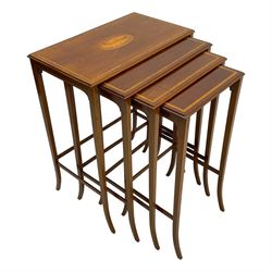 Edwardian inlaid mahogany quartetto nest of four occasional tables, each table with rectangular moulded top with satinwood band and central shell inlay, on square tapering supports with splayed terminals, inlaid with boxwood stringing