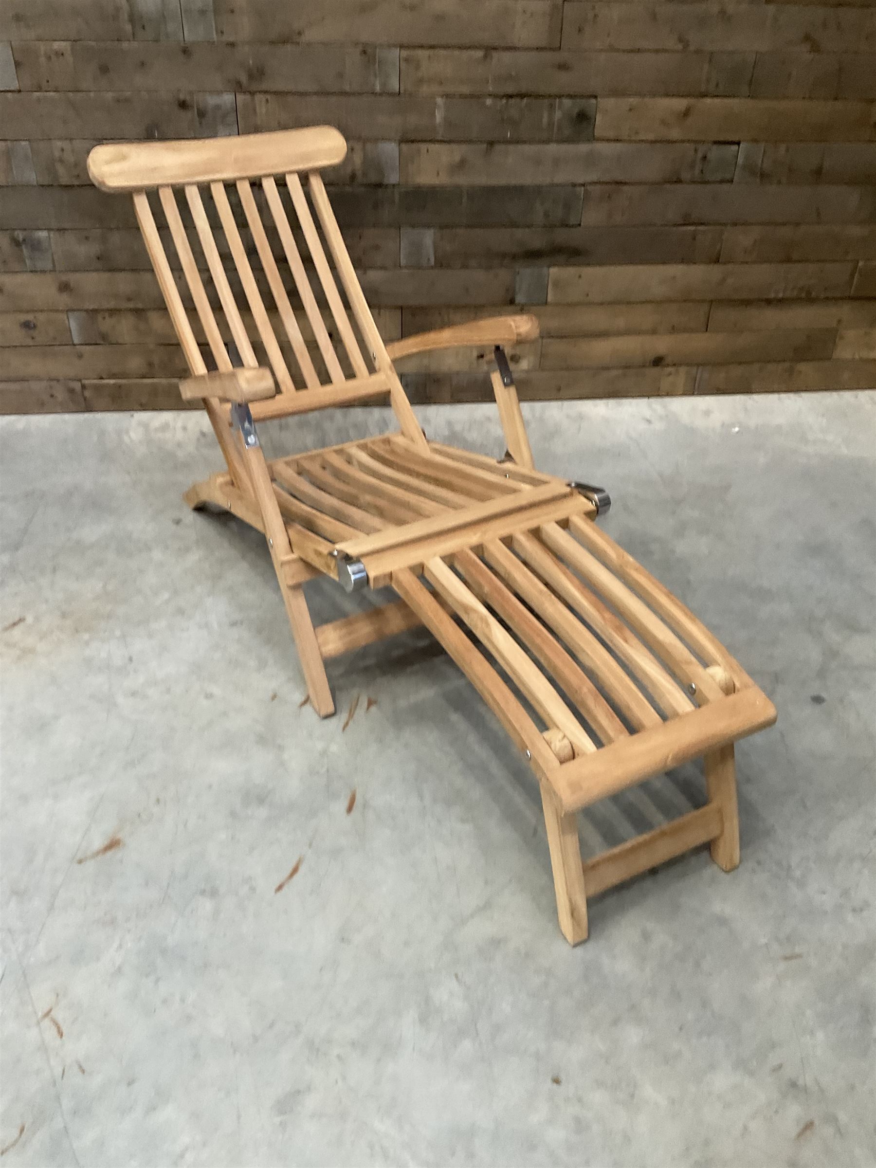 Pair of solid teak adjustable garden steamer armchairs, stainless brackets, with cushions