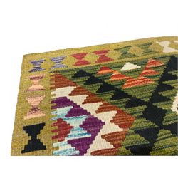 Chobi kilim multi-coloured rug, the field decorated with various lozenges with dark indigo borders, enclosed by a guard band with repeating broken-lozenge design