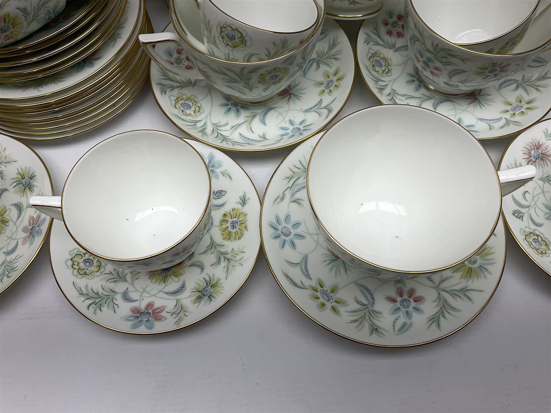 Minton Vanessa pattern part tea service, to include fifteen cups and saucers, open sucrier, milk jug, eighteen dessert plates, twelve side plates etc (70)