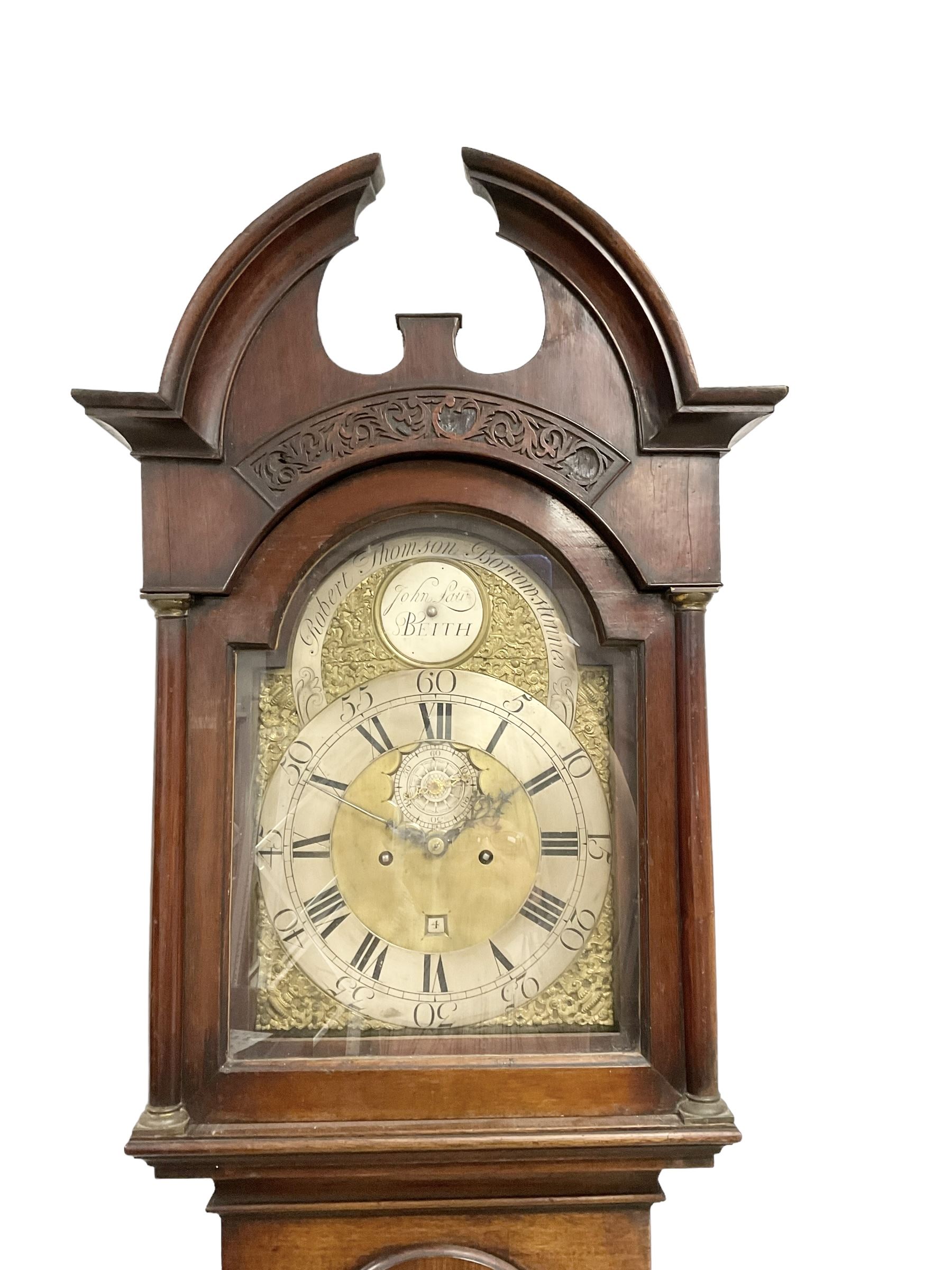 Late 18th century - 8-day Scottish mahogany longcase clock, with a broken arch pediment and blind fretwork beneath,  break arch hood door with attached pilasters and brass capitals,  trunk with a long door and break-arch top, rectangular plinth raised on plain bracket feet, brass dial with a matted dial centre, cast spandrels, pierced steel hands, recessed silvered seconds dial and square date aperture,  the names of John Law of Beith & Robert Thomson of Borrowstonnes (Bo'ness)  engraved separately on a silvered boss and cartouche ring in the dial arch, dial pinned directly to a rack striking two train weight driven movement, striking the hours on a bell. With weights and pendulum.


