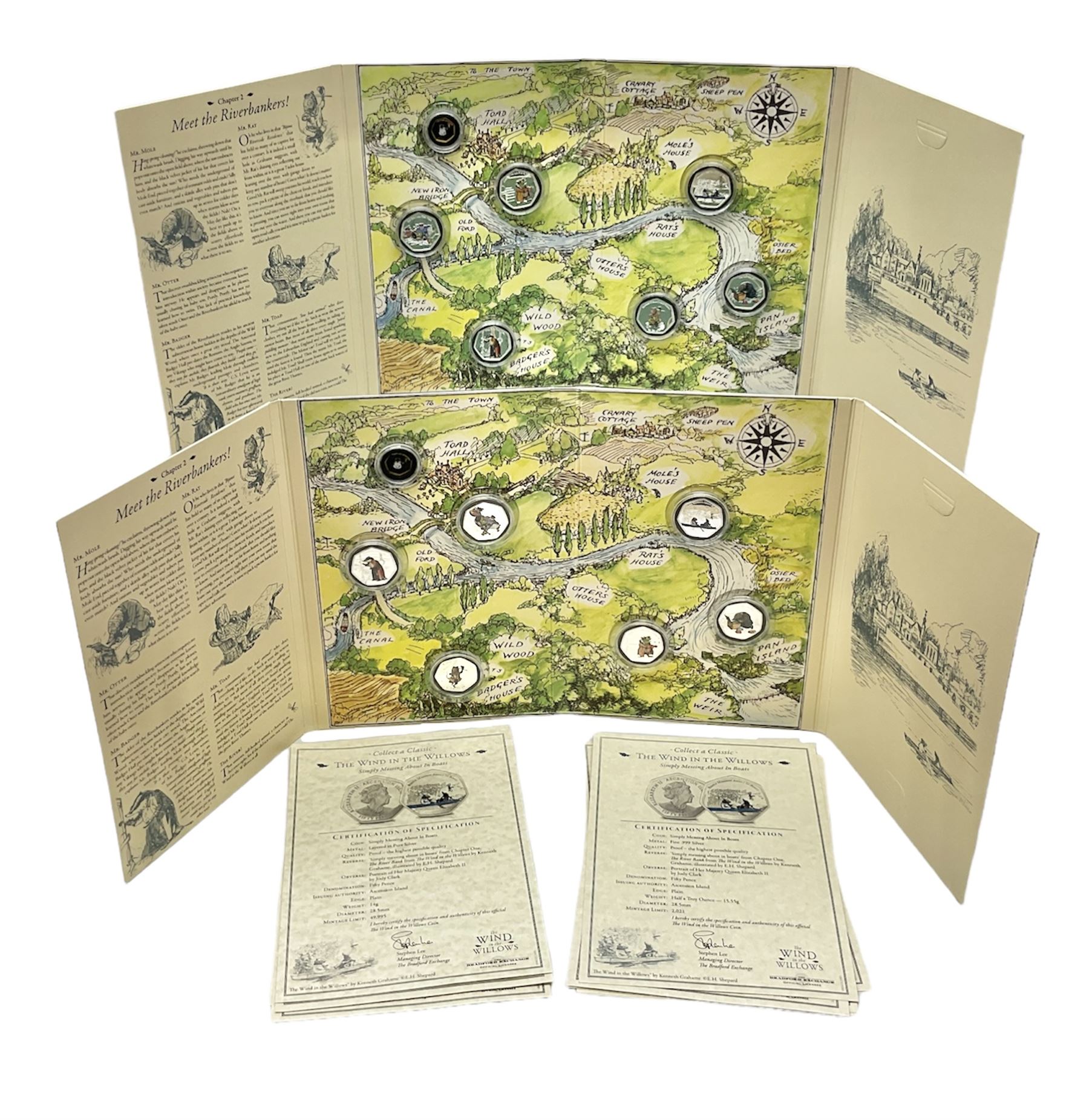 Two Queen Elizabeth II Ascension Island 2021 Wind in the Willows seven coin sets, both with 'Toad's Last Little Song' 24ct gold fifty pence weighing 2.25 grams, includes both layered in pure silver and fine .999 silver fifty pence pieces, housed in a presentation folders with certificates