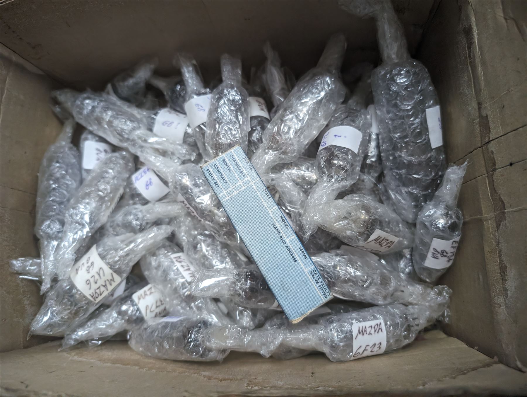 Large collection of Mazda thermionic radio valves/vacuum tubes, including boxed examples and loose bubble wrapped and identified examples