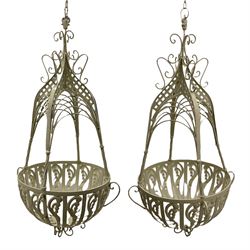 Pair of large cream finish ornate wrought metal hanging baskets

