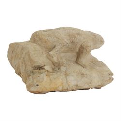 Pre-Columbian figure, probably limestone, carved as a lizard or frog upon a naturalistic base, H12cm