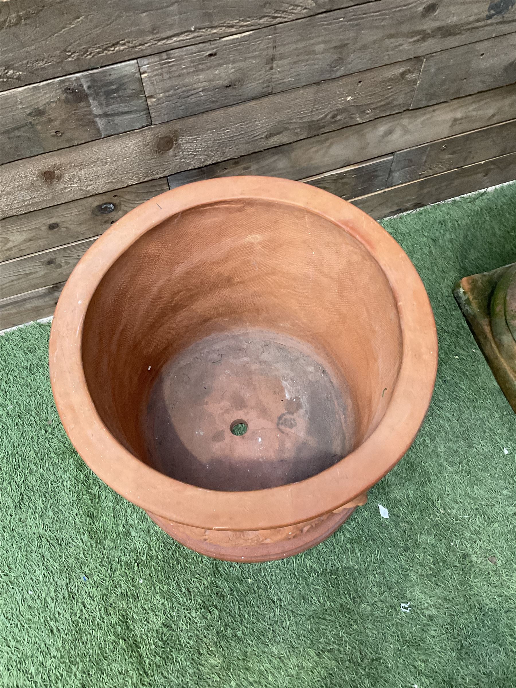 Circular terracotta garden planter, decorated with cherubs and terracotta urn on plinth - THIS LOT IS TO BE COLLECTED BY APPOINTMENT FROM DUGGLEBY STORAGE, GREAT HILL, EASTFIELD, SCARBOROUGH, YO11 3TX