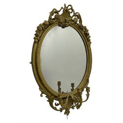 19th century giltwood and gesso girandole wall mirror, the raised pediment decorated with ribbon tie over curled acanthus leaves and flowerhead festoons, oval egg and dart moulded frame with outer bead, three projecting candle sconces in the form of scrolled acanthus leaves, lower shell motif with extending leaf decoration 