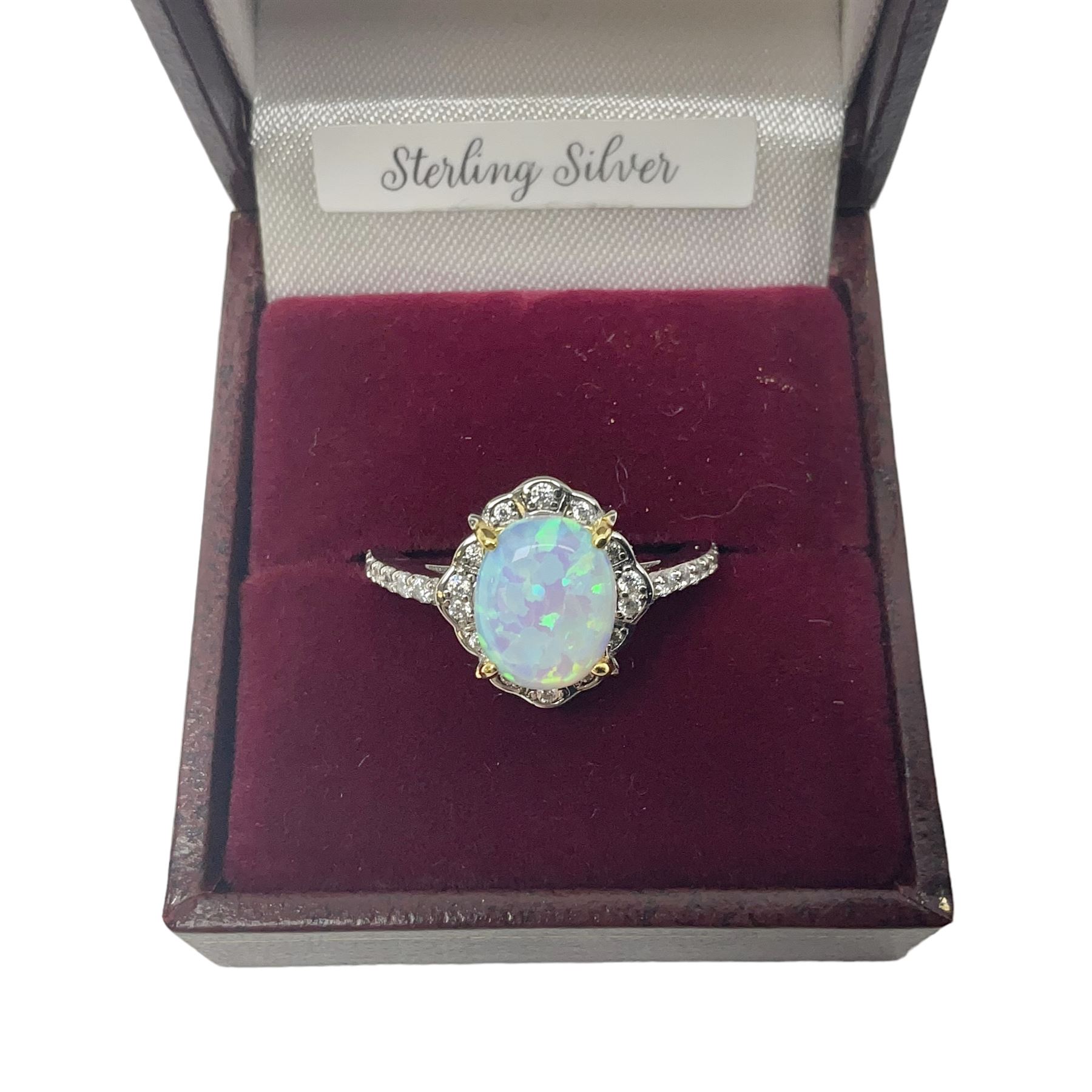 Silver opal and cubic zirconia cluster ring, stamped 925, boxed 