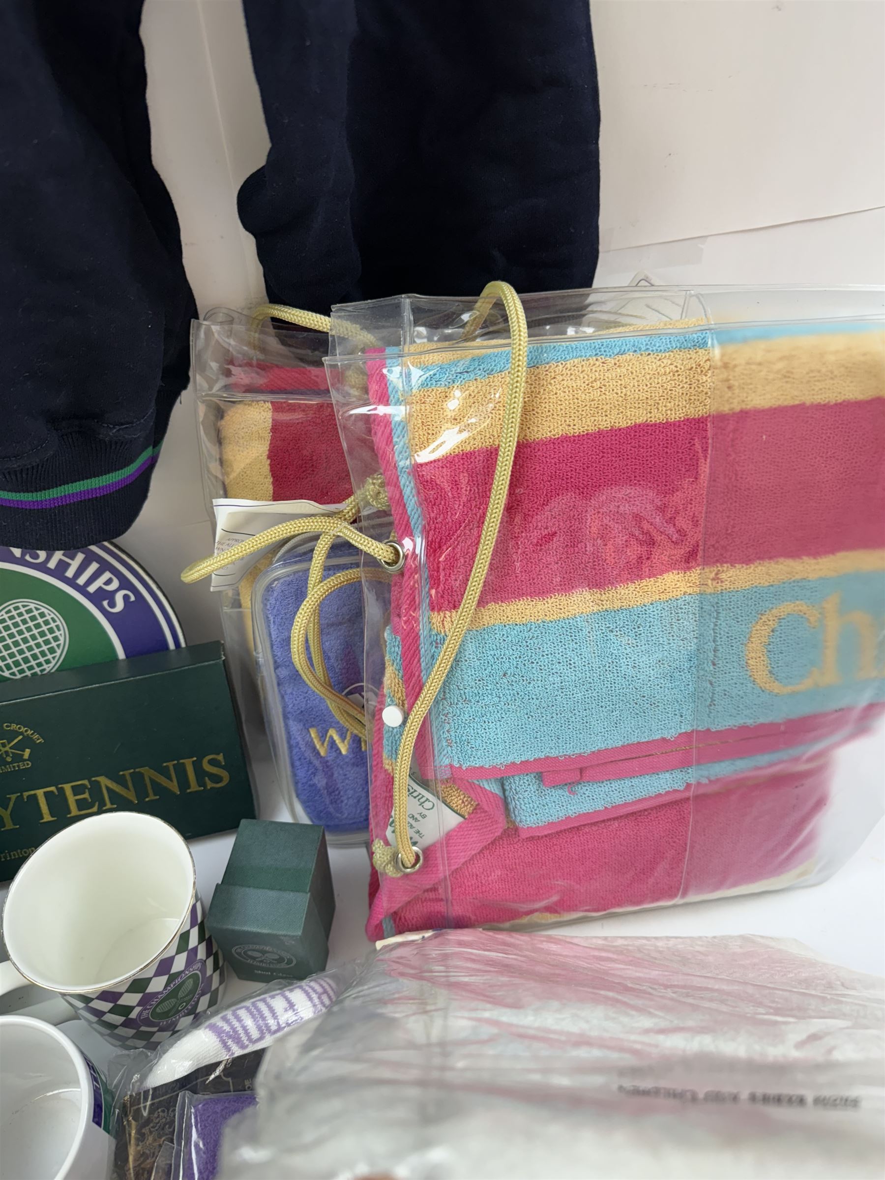 Collection of Wimbledon tennis memorabilia, including towels, programs, mugs, t-shirt, keyrings, ephemera etc