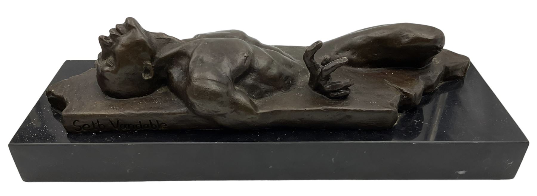 Bronze study of male nude after Seth Vandable, mounted on black marble plinth, L31cm