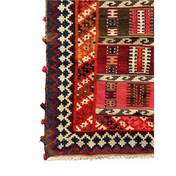 Southwest Persian Qashqai Kilim ground rug, featuring a series of horizontal striped panels each filled with intricate geometric designs, enclosed by a dark blue and ivory border with stylised star and zigzag motifs