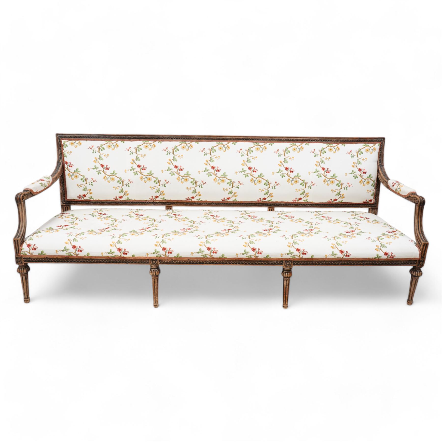 Late 19th century Swedish beech-framed settee, upholstered in cream fabric with trailing foliate pattern decorated with flowers, carved and moulded frame, scroll carved arm terminals on shaped moulded arm supports, on turned and fluted feet