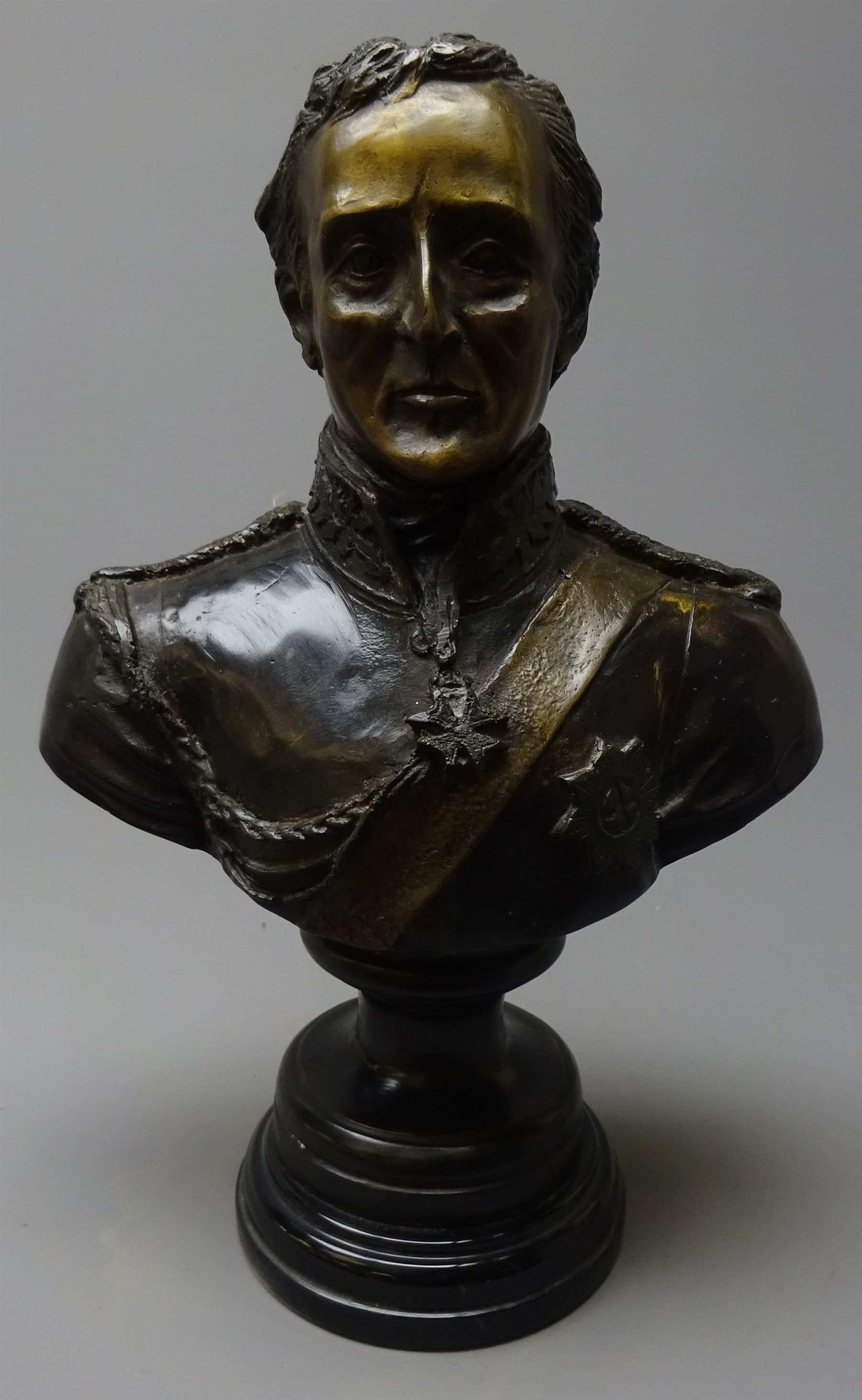Large bronze bust of the Duke of Wellington on black marble stepped ...