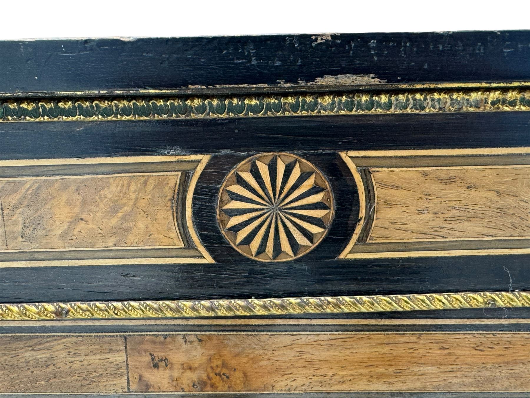 Victorian ebonised and walnut pier cabinet, rectangular top over figured frieze with central star motifs, enclosed by single glazed door, decorated with cast gilt metal mounts and beading, on chamfered plinth base 