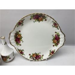 Royal Albert Old Country Roses pattern tea service for six, comprising teapot, sucrier, milk jug, dessert plates, one cake plate, one two tiered cake stand, salt and pepper pots and bud vase 