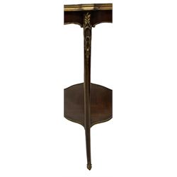 Early 20th century French two-tier marquetry inlaid walnut side table, shaped circular top with gilt metal edge, central chequered inlaid circular panel with floral motif, raised on cabriole supports with gilt metal mounts, united  by undertier