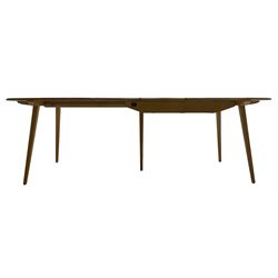 Ercol - light elm and beech 'Slide Leg Expanding Dining Table (444)', rectangular top with rounded corners, raised on tapered splayed supports, with two additional leaves