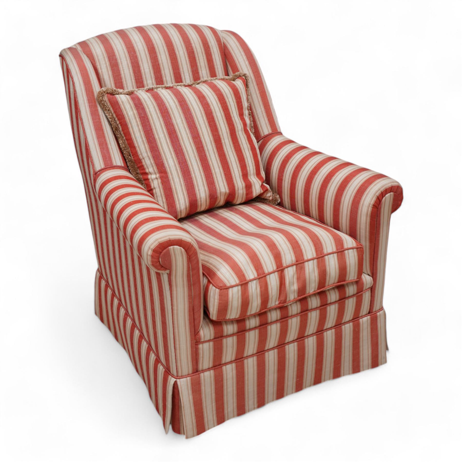 Edwardian hardwood-framed armchair, with rolled arms upholstered in red striped fabric, on square tapering front feet with brass and ceramic castors 