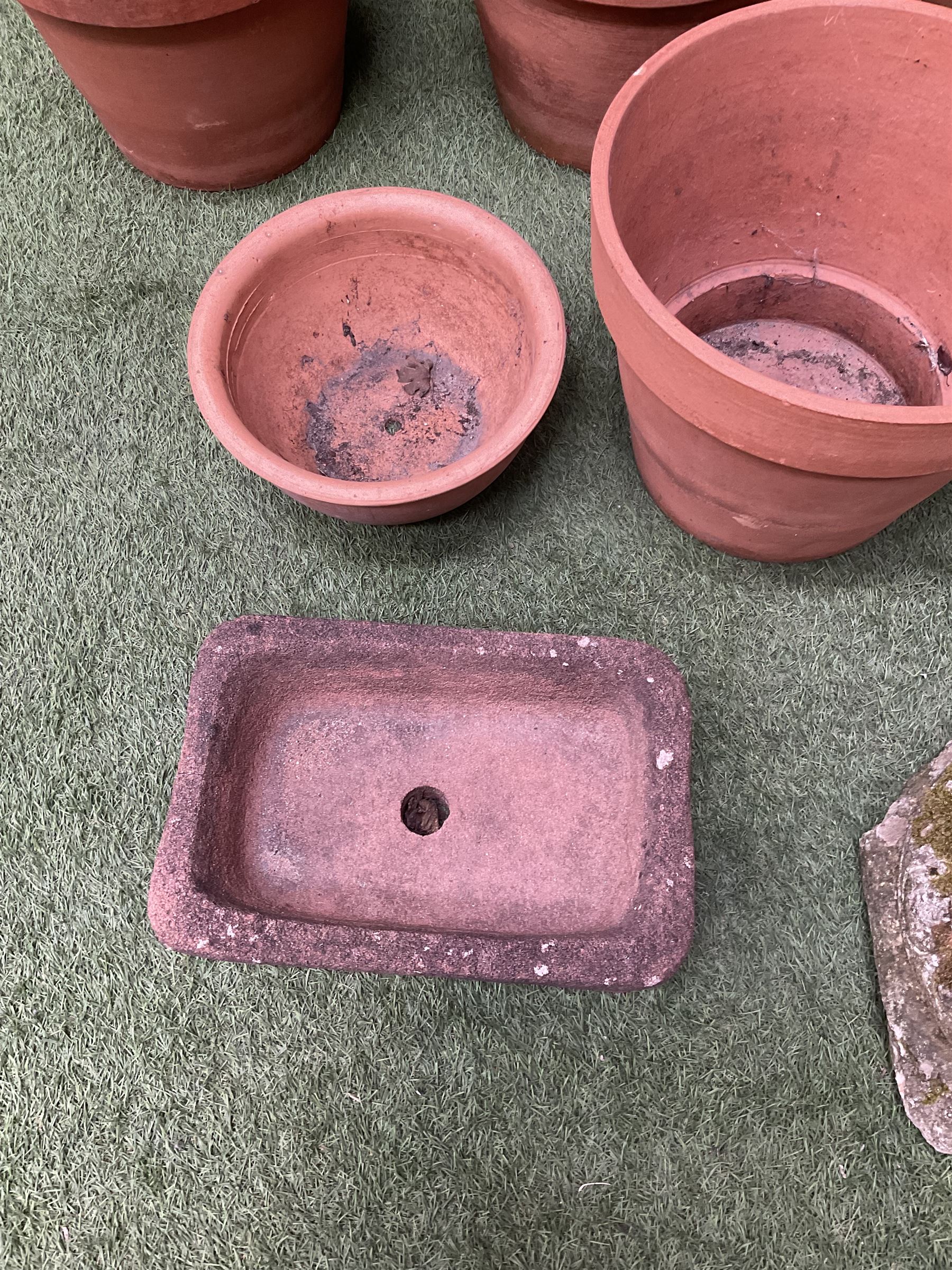 Set of five terracotta planters, small stone trough and urn plinth  - THIS LOT IS TO BE COLLECTED BY APPOINTMENT FROM DUGGLEBY STORAGE, GREAT HILL, EASTFIELD, SCARBOROUGH, YO11 3TX