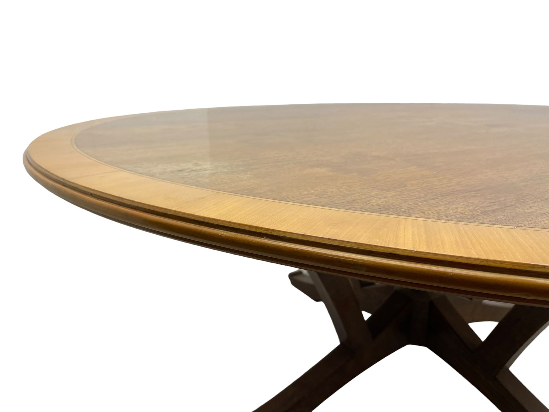 Senior & Carmichael, Betchworth - Georgian design walnut centre table, the circular moulded top with satinwood band and central star inlay, quadriform base with central orb and applied makers plaque, raised on splayed supports