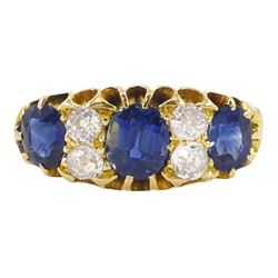 Victorian 18ct gold three stone oval cut sapphire and four stone old cut diamond ring, Chester 1898, total sapphire weight approx 1.70 carat, total diamond weight approx 0.40 carat