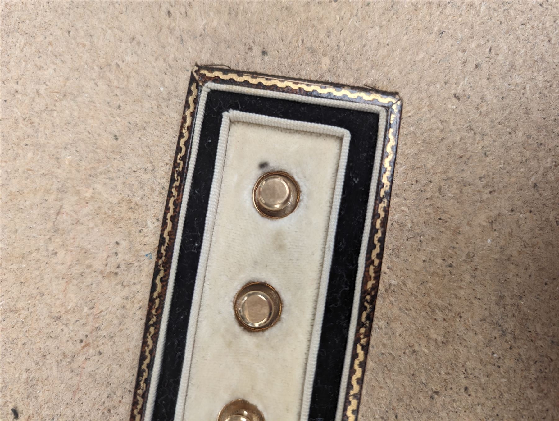 Cased set of three 9ct gold shirt studs