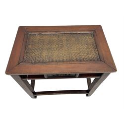 Pair of early 20th century Chinese hardwood side tables, each with rectangular woven cane top, pierced frieze with foliate motif, square supports joined by cross-stretchers