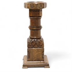 Early 20th century carved oak ecclesiastical baptismal font, circular dished top with hexagonal edge carved with Yorkshire rose and lettering, turned pedestal with acanthus carved decoration, on square base with ogee feet