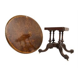 Victorian figured walnut loo table, oval moulded top with quarter matched veneers, on quadruple turned pillar base, acanthus carved splayed supports with scrolled terminals