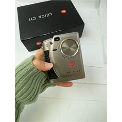 Leica C11 APS film compact camera, in silver and chrome finish, serial no. 2636834, in original clear hard case and box, with instruction booklet, together with a Leica Digilux 4.3, with 1:2.8-4.5/8.3-24.9mm lens, serial no. 2598862, with instruction booklet